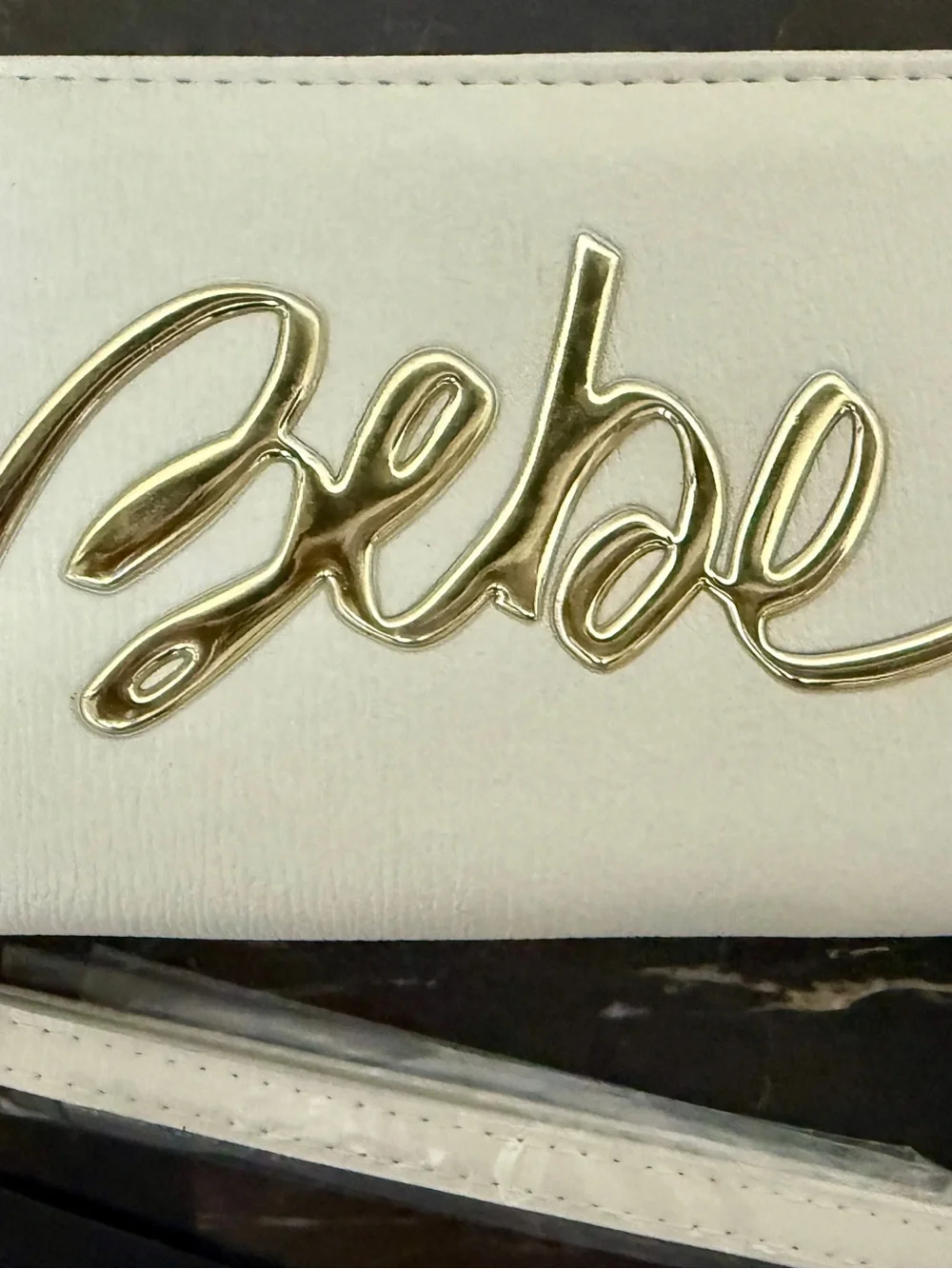 Bebe off White Wristlet Clutch with Gold Logo Accent